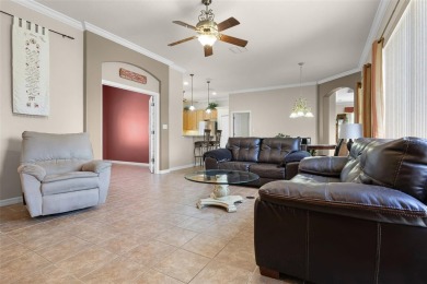Step into the lifestyle you've been dreaming of in the vibrant on Plantation Golf Club in Florida - for sale on GolfHomes.com, golf home, golf lot