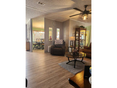 This beautiful 2-bedroom, 2-bath split-floor plan home is on Pine Lakes Country Club in Florida - for sale on GolfHomes.com, golf home, golf lot