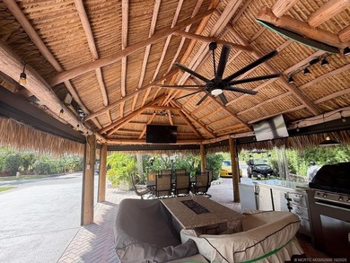 Exceptional Lot with Banyan Tree and Lake Views - Move-In Ready! on St. Lucie Trail Golf Club in Florida - for sale on GolfHomes.com, golf home, golf lot