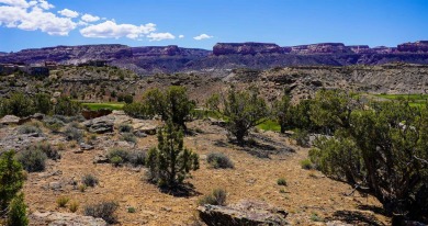 Nestled on the edge of a dramatic cliff, this exceptional on The Golf Club At Redlands Mesa in Colorado - for sale on GolfHomes.com, golf home, golf lot
