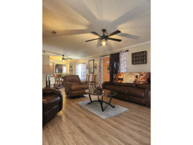 This beautiful 2-bedroom, 2-bath split-floor plan home is on Pine Lakes Country Club in Florida - for sale on GolfHomes.com, golf home, golf lot