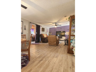 This beautiful 2-bedroom, 2-bath split-floor plan home is on Pine Lakes Country Club in Florida - for sale on GolfHomes.com, golf home, golf lot