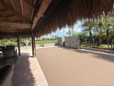 Exceptional Lot with Banyan Tree and Lake Views - Move-In Ready! on St. Lucie Trail Golf Club in Florida - for sale on GolfHomes.com, golf home, golf lot