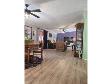This beautiful 2-bedroom, 2-bath split-floor plan home is on Pine Lakes Country Club in Florida - for sale on GolfHomes.com, golf home, golf lot