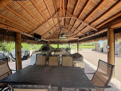 Exceptional Lot with Banyan Tree and Lake Views - Move-In Ready! on St. Lucie Trail Golf Club in Florida - for sale on GolfHomes.com, golf home, golf lot