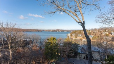 Lovely home with an amazing view of the lake.  Totally turn key on The Oaks Golf Course in Missouri - for sale on GolfHomes.com, golf home, golf lot