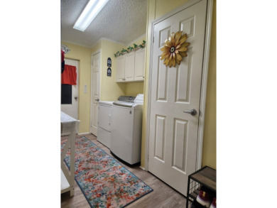 This beautiful 2-bedroom, 2-bath split-floor plan home is on Pine Lakes Country Club in Florida - for sale on GolfHomes.com, golf home, golf lot