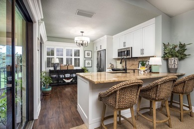 This stunning end-unit condo exudes class and sophistication on Martin Downs Country Club in Florida - for sale on GolfHomes.com, golf home, golf lot