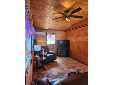 This beautiful 2-bedroom, 2-bath split-floor plan home is on Pine Lakes Country Club in Florida - for sale on GolfHomes.com, golf home, golf lot