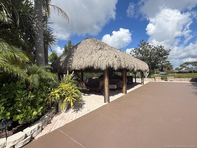 Exceptional Lot with Banyan Tree and Lake Views - Move-In Ready! on St. Lucie Trail Golf Club in Florida - for sale on GolfHomes.com, golf home, golf lot