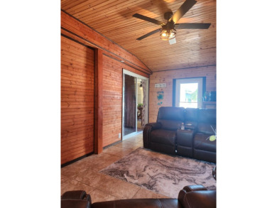 This beautiful 2-bedroom, 2-bath split-floor plan home is on Pine Lakes Country Club in Florida - for sale on GolfHomes.com, golf home, golf lot