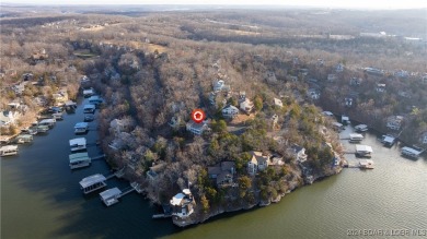 Lovely home with an amazing view of the lake.  Totally turn key on The Oaks Golf Course in Missouri - for sale on GolfHomes.com, golf home, golf lot