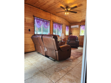 This beautiful 2-bedroom, 2-bath split-floor plan home is on Pine Lakes Country Club in Florida - for sale on GolfHomes.com, golf home, golf lot