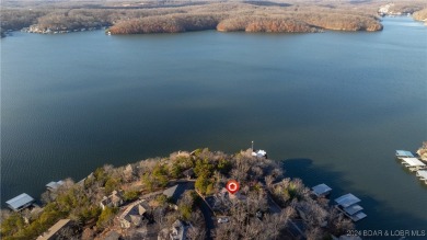 Lovely home with an amazing view of the lake.  Totally turn key on The Oaks Golf Course in Missouri - for sale on GolfHomes.com, golf home, golf lot