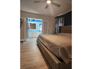 This beautiful 2-bedroom, 2-bath split-floor plan home is on Pine Lakes Country Club in Florida - for sale on GolfHomes.com, golf home, golf lot