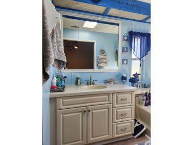 This beautiful 2-bedroom, 2-bath split-floor plan home is on Pine Lakes Country Club in Florida - for sale on GolfHomes.com, golf home, golf lot