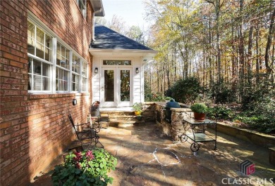 Presenting a stately traditional home where striking elements on Jennings Mill Country Club in Georgia - for sale on GolfHomes.com, golf home, golf lot