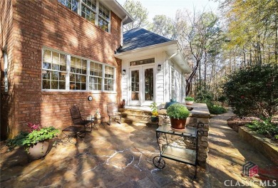 Presenting a stately traditional home where striking elements on Jennings Mill Country Club in Georgia - for sale on GolfHomes.com, golf home, golf lot