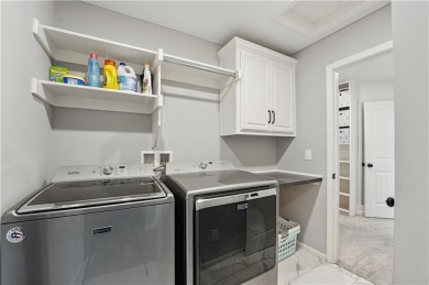 Discover the epitome of comfortable living in this 2-story gem on Tiffany Greens Golf Club in Missouri - for sale on GolfHomes.com, golf home, golf lot