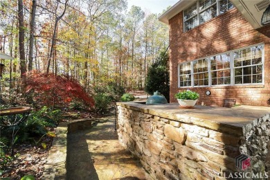 Presenting a stately traditional home where striking elements on Jennings Mill Country Club in Georgia - for sale on GolfHomes.com, golf home, golf lot