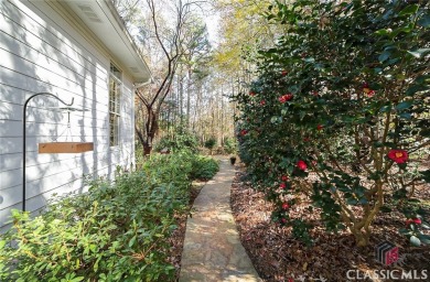 Presenting a stately traditional home where striking elements on Jennings Mill Country Club in Georgia - for sale on GolfHomes.com, golf home, golf lot