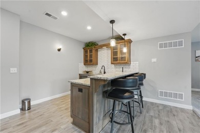 Discover the epitome of comfortable living in this 2-story gem on Tiffany Greens Golf Club in Missouri - for sale on GolfHomes.com, golf home, golf lot