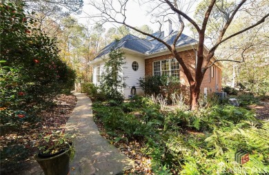 Presenting a stately traditional home where striking elements on Jennings Mill Country Club in Georgia - for sale on GolfHomes.com, golf home, golf lot