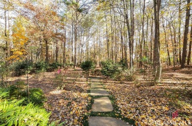 Presenting a stately traditional home where striking elements on Jennings Mill Country Club in Georgia - for sale on GolfHomes.com, golf home, golf lot