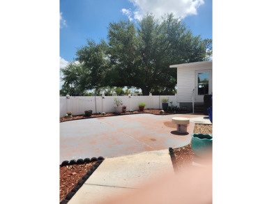 This beautiful 2-bedroom, 2-bath split-floor plan home is on Pine Lakes Country Club in Florida - for sale on GolfHomes.com, golf home, golf lot