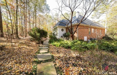 Presenting a stately traditional home where striking elements on Jennings Mill Country Club in Georgia - for sale on GolfHomes.com, golf home, golf lot