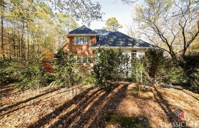 Presenting a stately traditional home where striking elements on Jennings Mill Country Club in Georgia - for sale on GolfHomes.com, golf home, golf lot