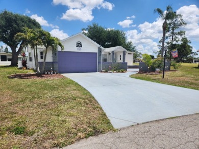 This beautiful 2-bedroom, 2-bath split-floor plan home is on Pine Lakes Country Club in Florida - for sale on GolfHomes.com, golf home, golf lot