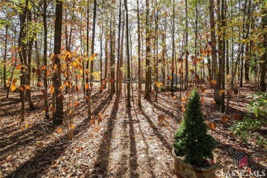 Presenting a stately traditional home where striking elements on Jennings Mill Country Club in Georgia - for sale on GolfHomes.com, golf home, golf lot