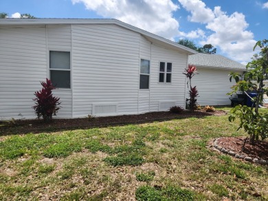 This beautiful 2-bedroom, 2-bath split-floor plan home is on Pine Lakes Country Club in Florida - for sale on GolfHomes.com, golf home, golf lot