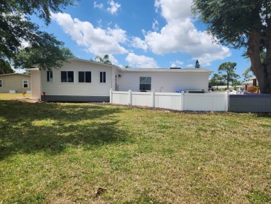 This beautiful 2-bedroom, 2-bath split-floor plan home is on Pine Lakes Country Club in Florida - for sale on GolfHomes.com, golf home, golf lot