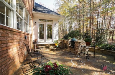 Presenting a stately traditional home where striking elements on Jennings Mill Country Club in Georgia - for sale on GolfHomes.com, golf home, golf lot