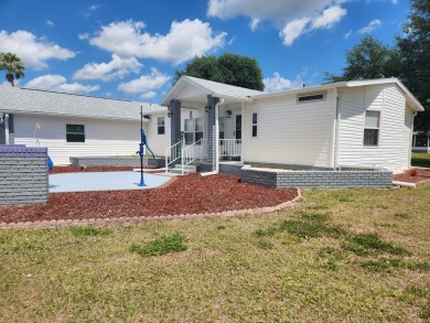 This beautiful 2-bedroom, 2-bath split-floor plan home is on Pine Lakes Country Club in Florida - for sale on GolfHomes.com, golf home, golf lot