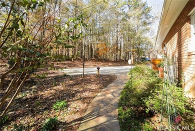 Presenting a stately traditional home where striking elements on Jennings Mill Country Club in Georgia - for sale on GolfHomes.com, golf home, golf lot