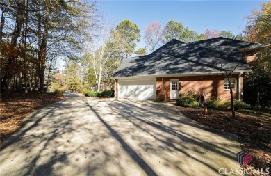 Presenting a stately traditional home where striking elements on Jennings Mill Country Club in Georgia - for sale on GolfHomes.com, golf home, golf lot