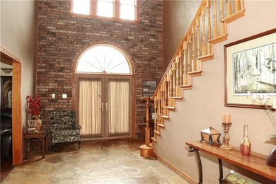 Welcome to 10812 Bay Ridge Drive -- a beautiful two-story home on Lions Den Golf Club in Arkansas - for sale on GolfHomes.com, golf home, golf lot