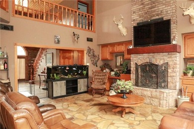 Welcome to 10812 Bay Ridge Drive -- a beautiful two-story home on Lions Den Golf Club in Arkansas - for sale on GolfHomes.com, golf home, golf lot