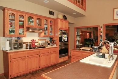 Welcome to 10812 Bay Ridge Drive -- a beautiful two-story home on Lions Den Golf Club in Arkansas - for sale on GolfHomes.com, golf home, golf lot