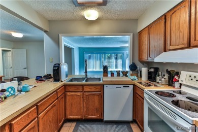 This spacious 3-bedroom 2-bath home is located in the heart of on Plantation Inn and Golf Resort  in Florida - for sale on GolfHomes.com, golf home, golf lot