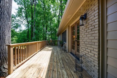 Stunning home with a rocking chair front porch on a friendly on Bobby Jones Golf Club in Georgia - for sale on GolfHomes.com, golf home, golf lot