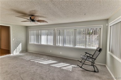 This spacious 3-bedroom 2-bath home is located in the heart of on Plantation Inn and Golf Resort  in Florida - for sale on GolfHomes.com, golf home, golf lot