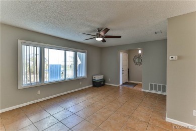 This spacious 3-bedroom 2-bath home is located in the heart of on Plantation Inn and Golf Resort  in Florida - for sale on GolfHomes.com, golf home, golf lot