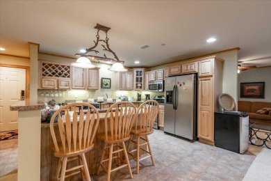 Executive style living can be yours in this Penthouse at on Northern Bay Golf Resort and Marina in Wisconsin - for sale on GolfHomes.com, golf home, golf lot