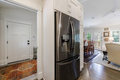 Stunning home with a rocking chair front porch on a friendly on Bobby Jones Golf Club in Georgia - for sale on GolfHomes.com, golf home, golf lot