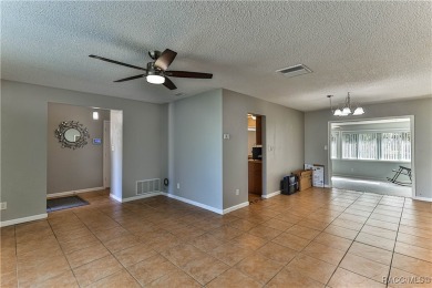 This spacious 3-bedroom 2-bath home is located in the heart of on Plantation Inn and Golf Resort  in Florida - for sale on GolfHomes.com, golf home, golf lot