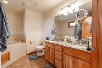 Executive style living can be yours in this Penthouse at on Northern Bay Golf Resort and Marina in Wisconsin - for sale on GolfHomes.com, golf home, golf lot